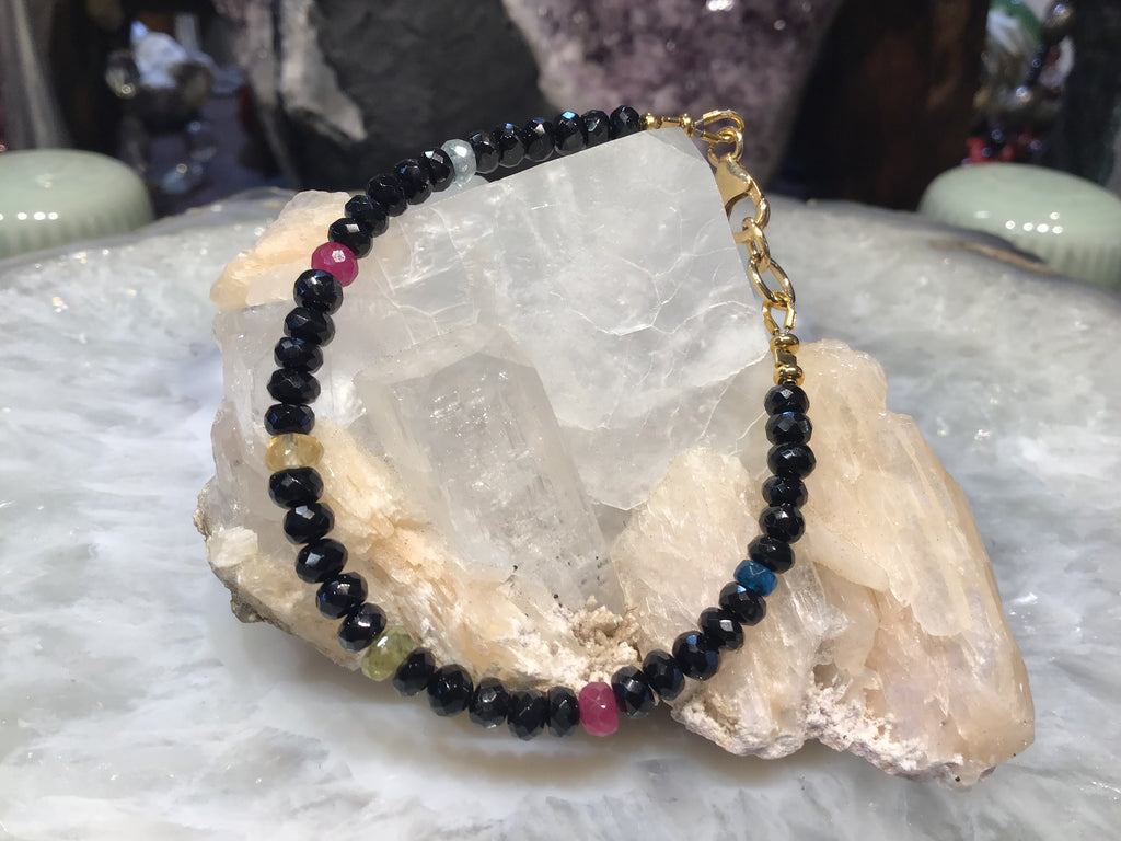 Black spinel and multi gem faceted gemstone bracelet