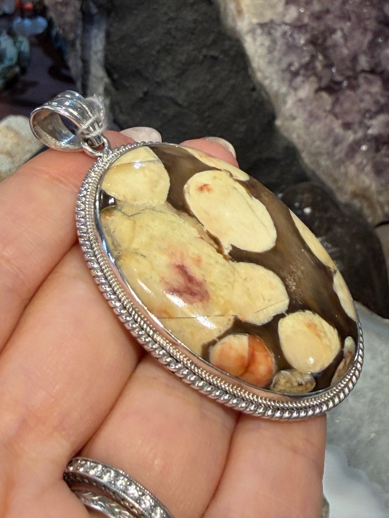 Peanut wood fossil Nepal sterling silver pendant