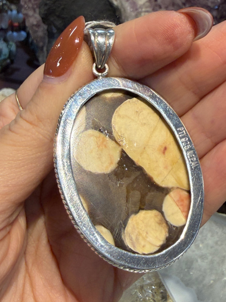 Peanut wood fossil Nepal sterling silver pendant