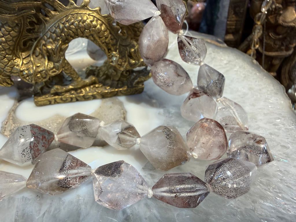 Rare lepidocrocite in quartz diamond cut gemstones beads