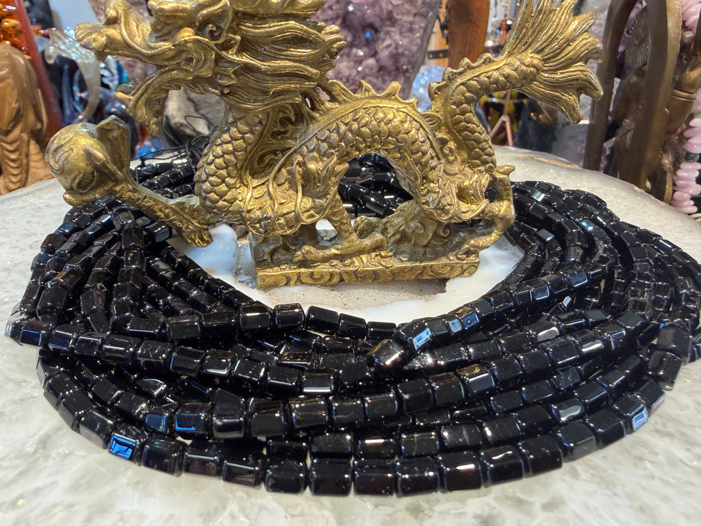Black tourmaline cut cylinder 7mm gemstone