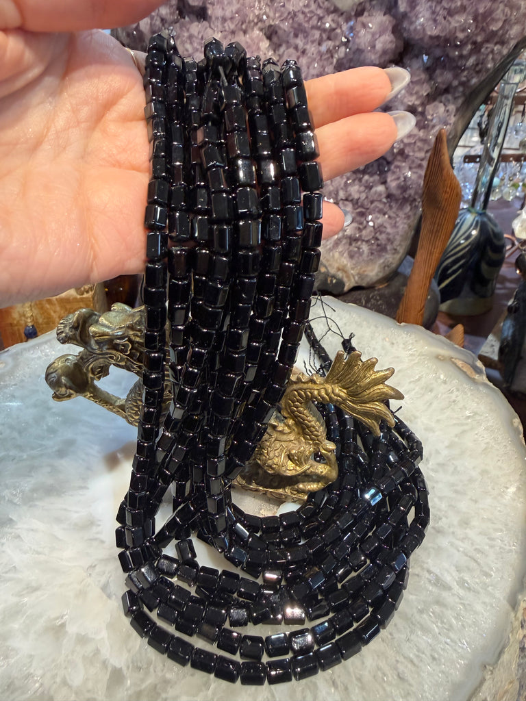 Black tourmaline cut cylinder 7mm gemstone