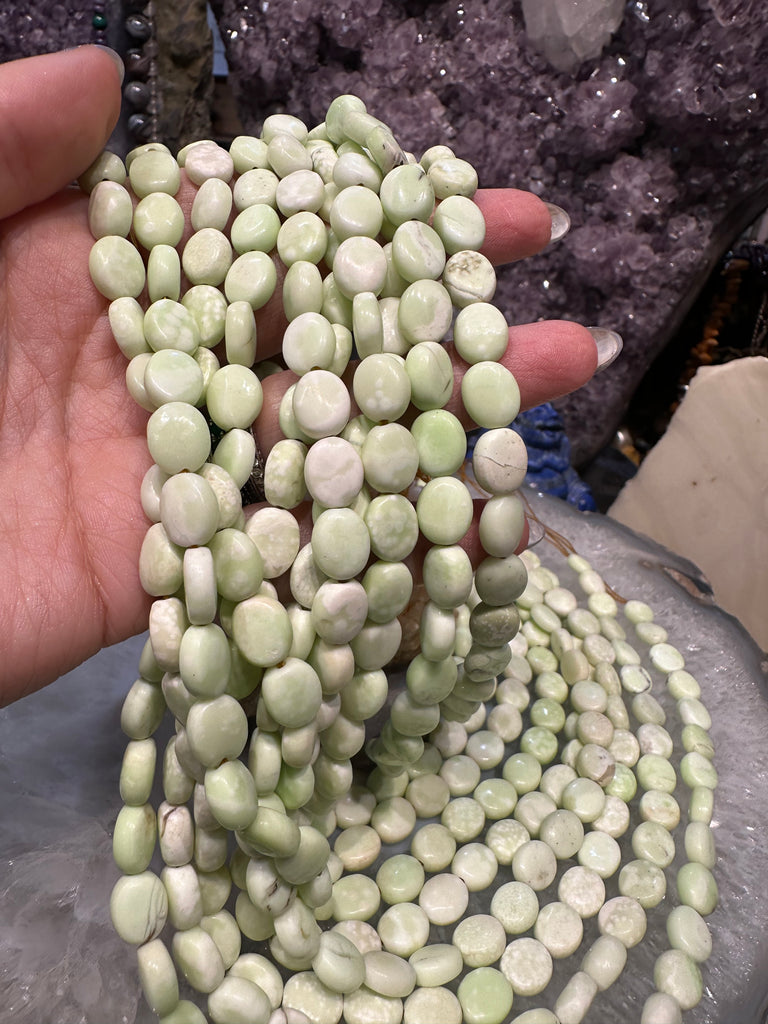 Lemon magnesite oval 10mm gemstone beads