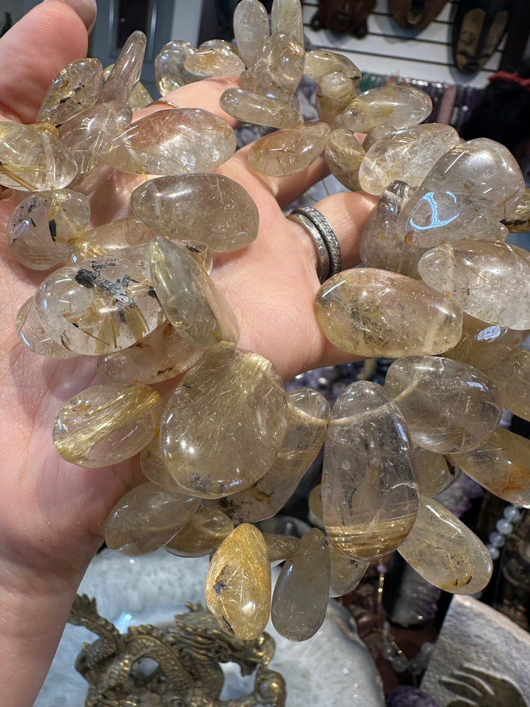Golden rutile quartz top drilled gemstone