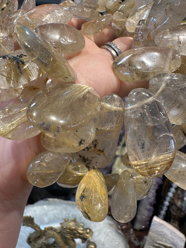 Golden rutile quartz top drilled gemstone