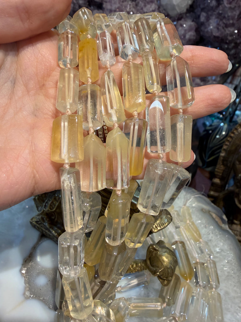 Yellow hematoid quartz cut barrel gemstones