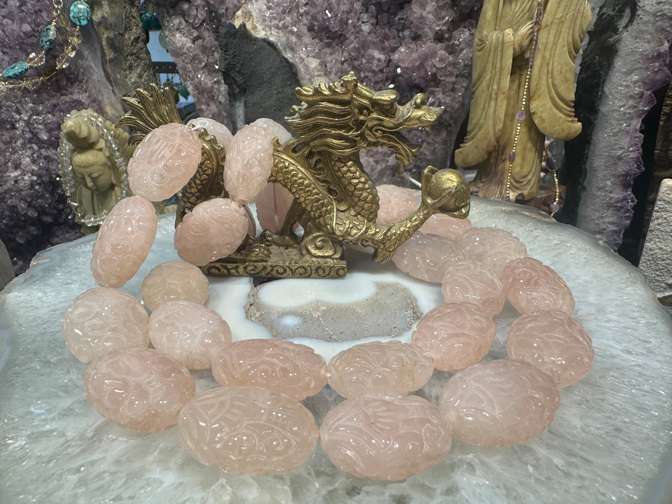 Rose quartz carved 29x22mm oval gemstone