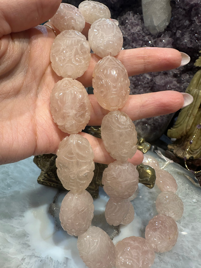 Rose quartz carved 29x22mm oval gemstone