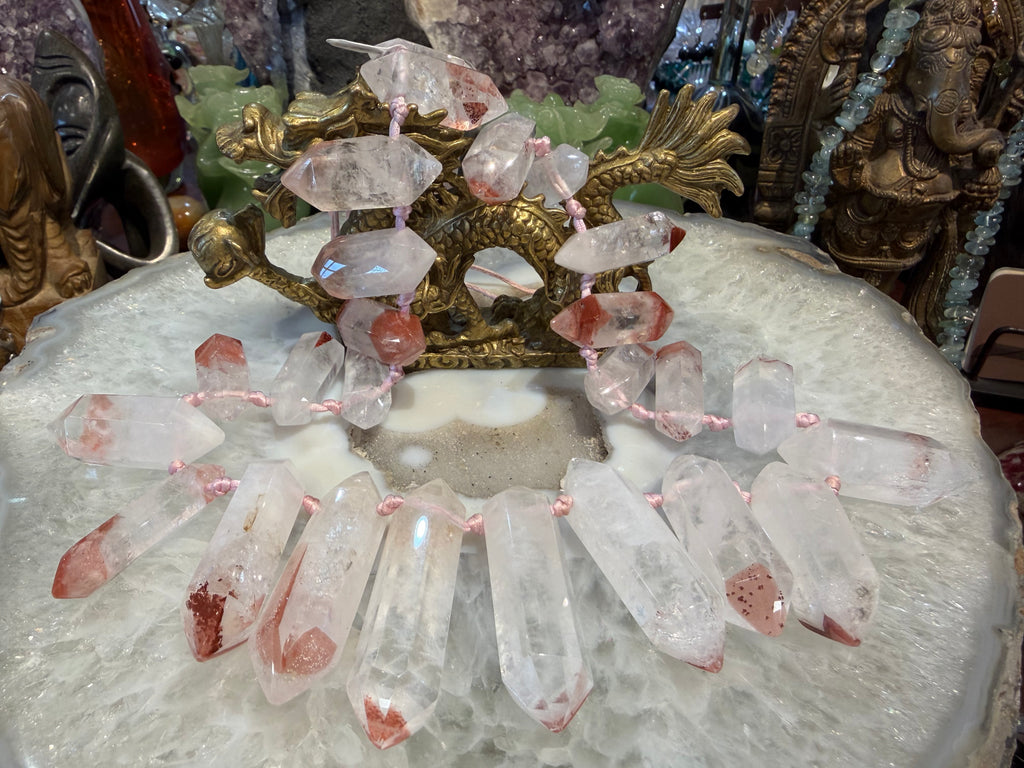 Superb lepidocrocite in quartz terminated pendant strand