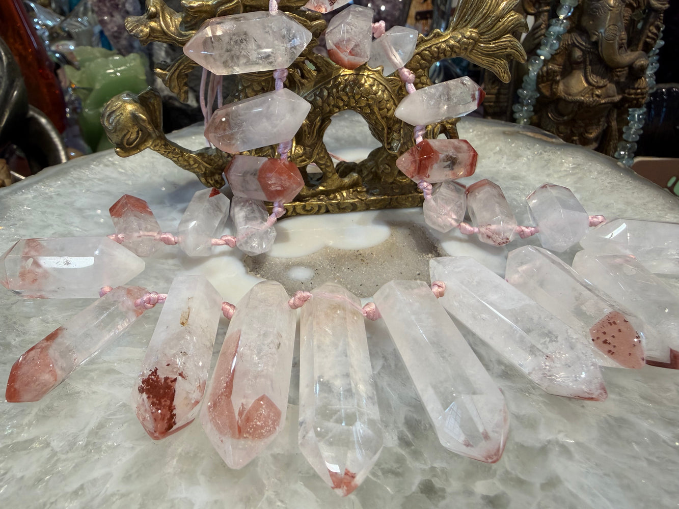 Superb lepidocrocite in quartz terminated pendant strand