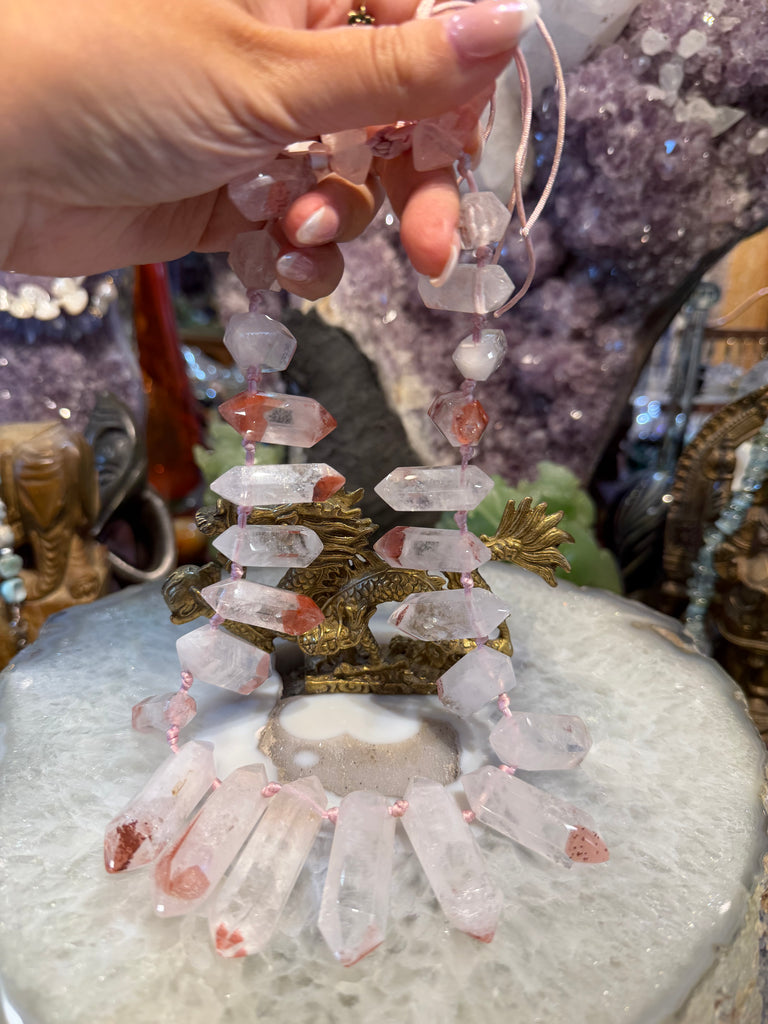 Superb lepidocrocite in quartz terminated pendant strand