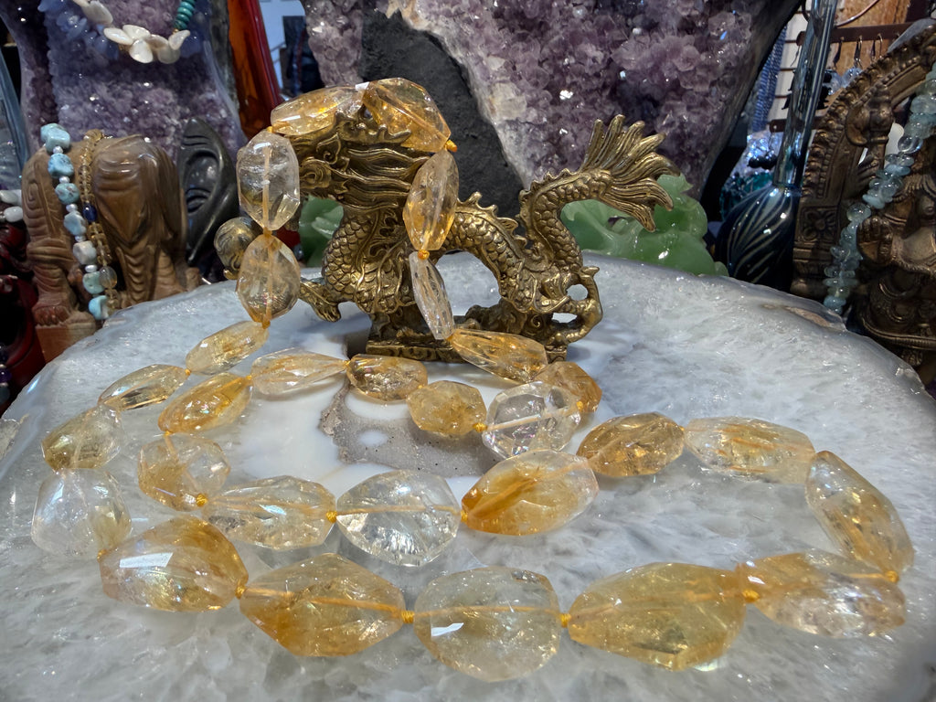Stunning citrine faceted gem cut long knotted gemstone