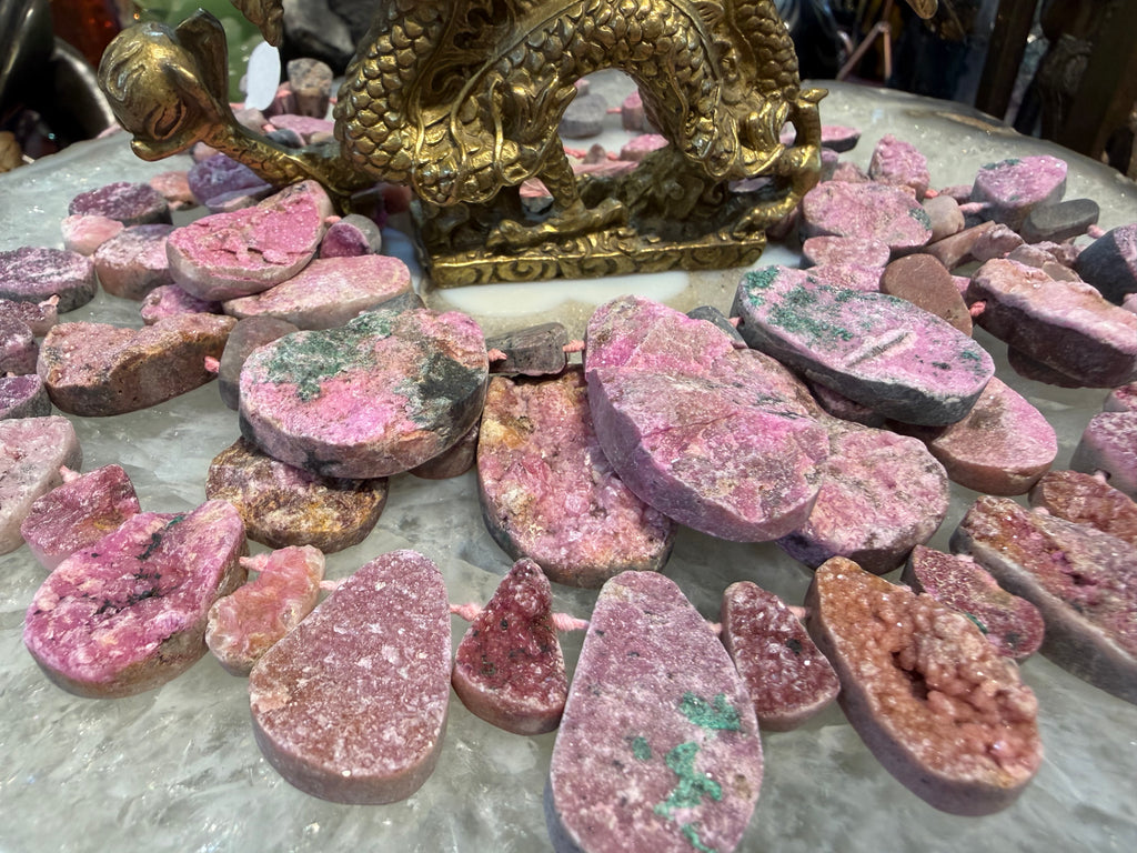 Pink cobaltoan calcite top drilled gemstones
