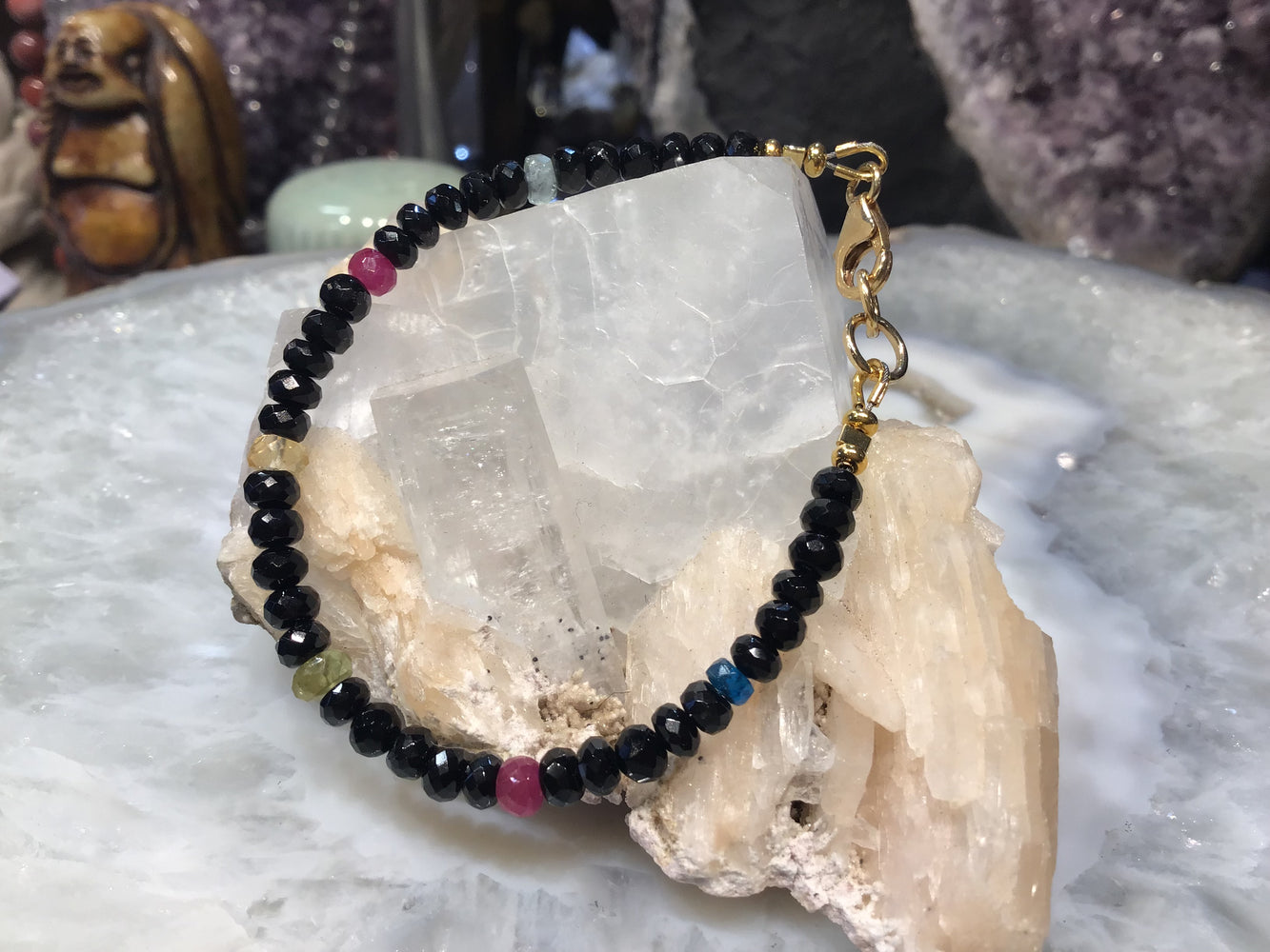 Black spinel and multi gem faceted gemstone bracelet