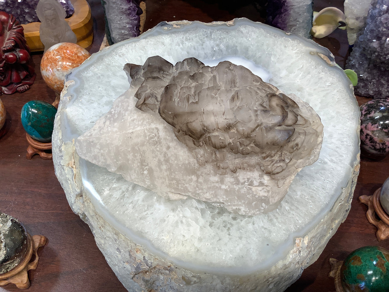 Large elestial smoky quartz gemstone specimen
